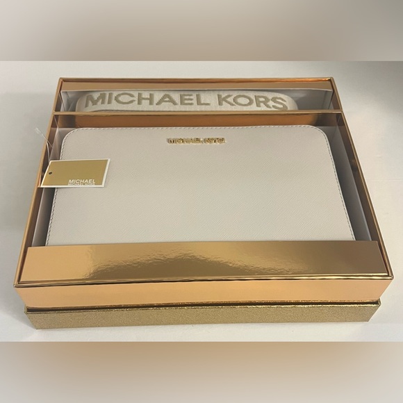 New MICHAEL KORS JET SET LG XBODY LEATHER CREAM BAG With Box - Picture 15 of 16
